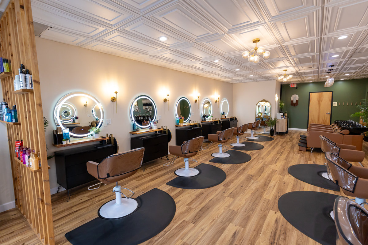 Styling chairs under the chandelier at Solace Salon