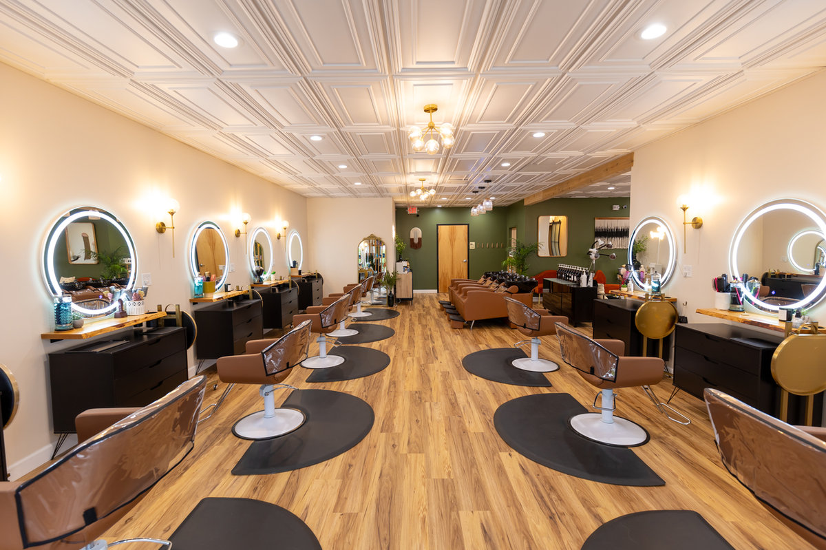 Wide view of the Solace Salon styling floor