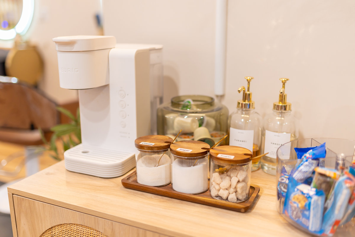Coffee and beverage station at Solace Salon