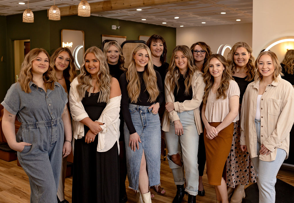 The Solace Salon team gathered together inside the salon
