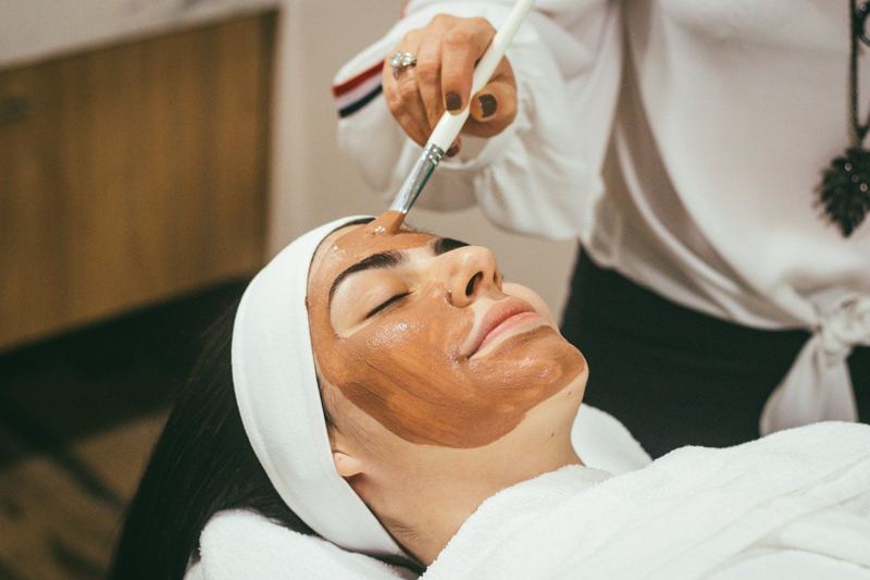 Client reclined during a luxurious scalp treatment